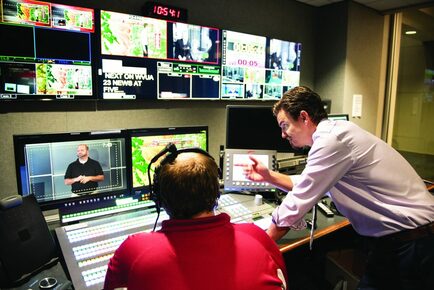 Dr. Griffin in WVUA23 editing room